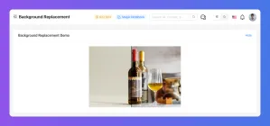 Screenshot of a "Background Replacement" demo featuring two bottles and a glass with amber liquid.